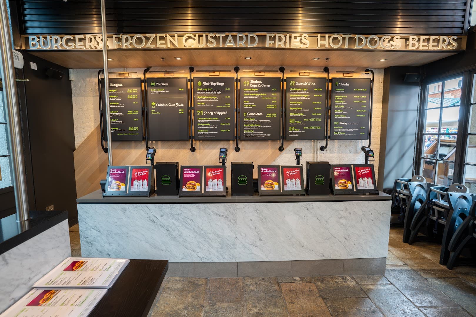 Ordering counter and menu boards at Shake Shack Covent Garden, London
