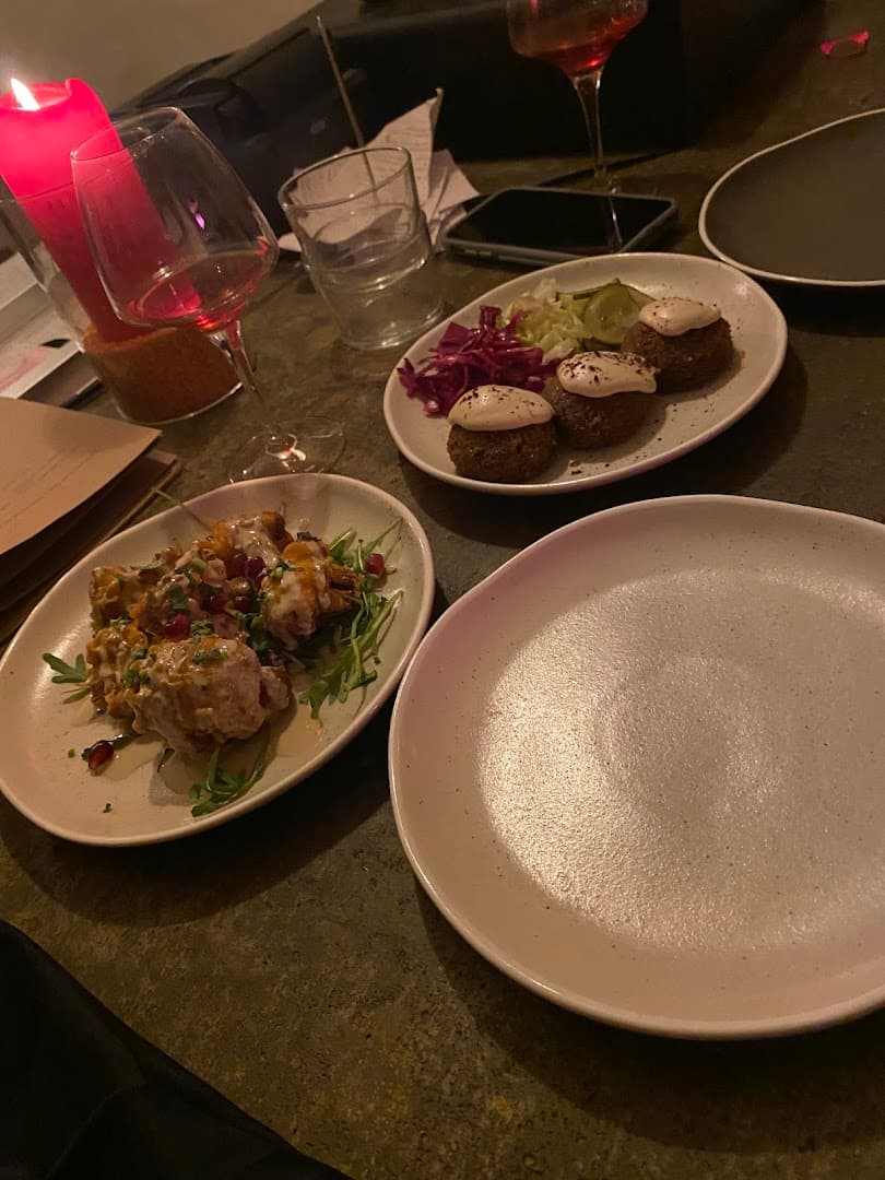 Sharing plates table setting at AYA & SUKI, London