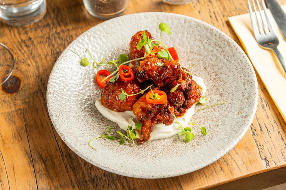 Glazed chicken wings at Humble Grape Fleet Street Wine Bar & Restaurant, London