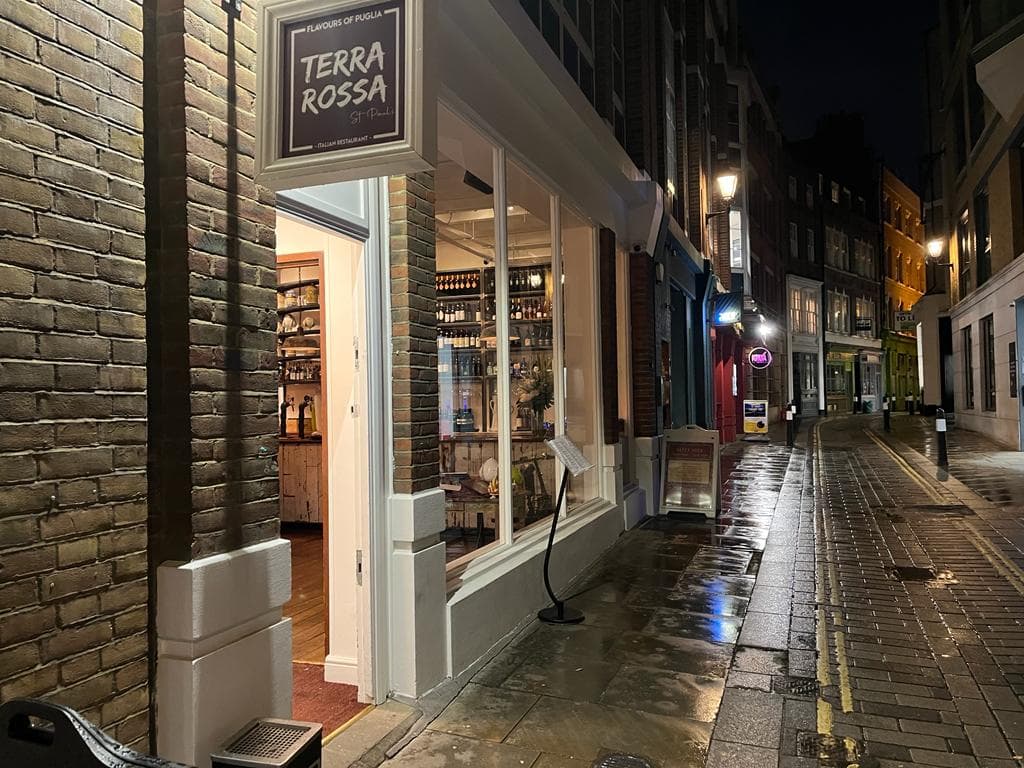 Front entrance at night at Terra Rossa, London