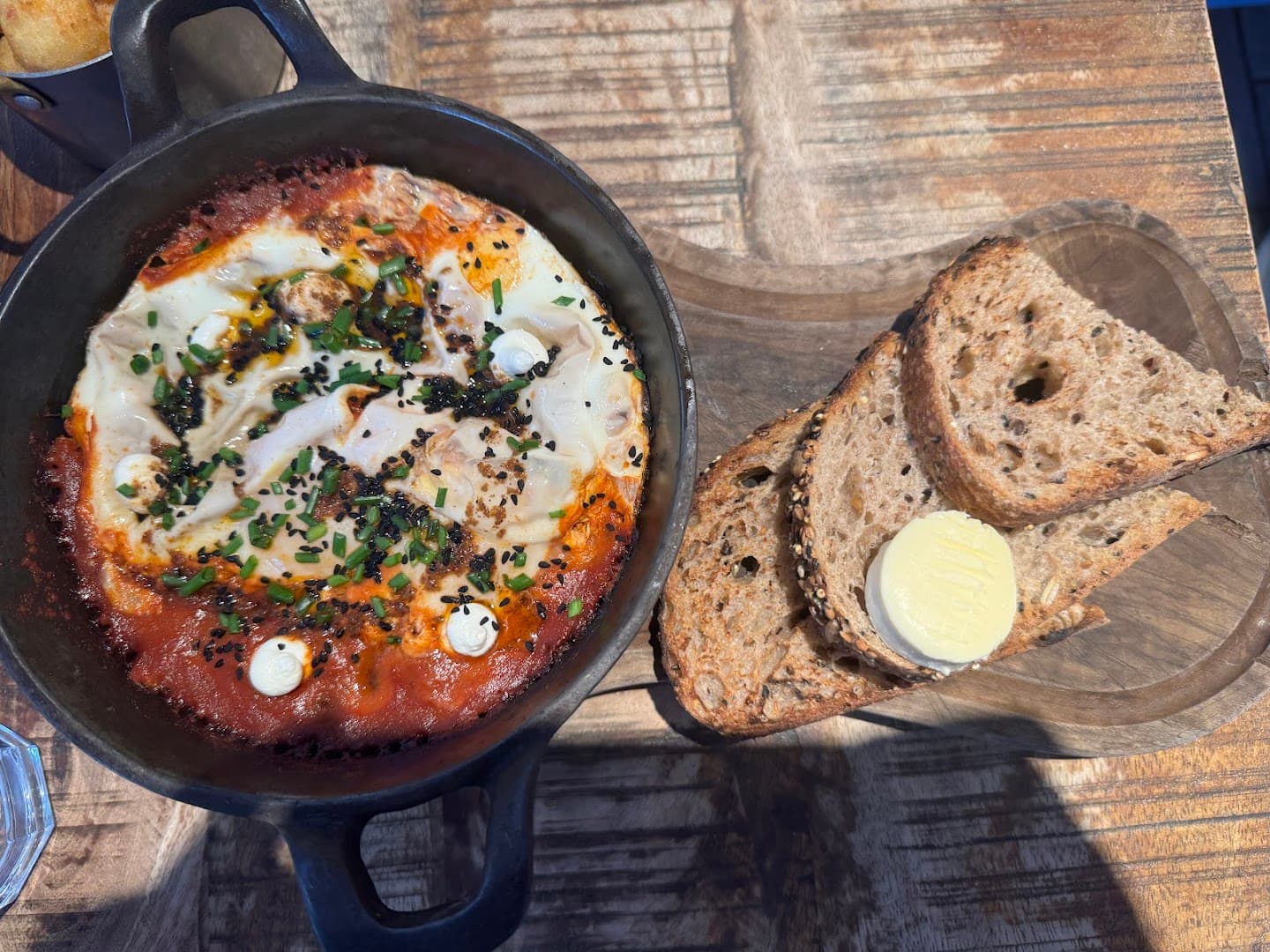 Baked eggs skillet breakfast at Megan's on the High Street Restaurant, Kensington, London