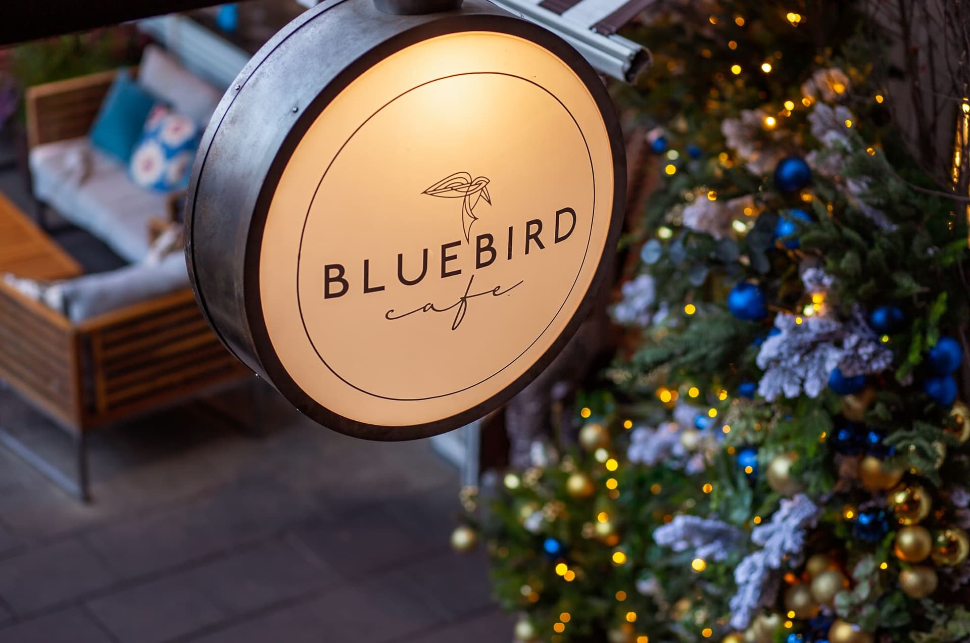Illuminated Bluebird Cafe signage at Bluebird Chelsea, London