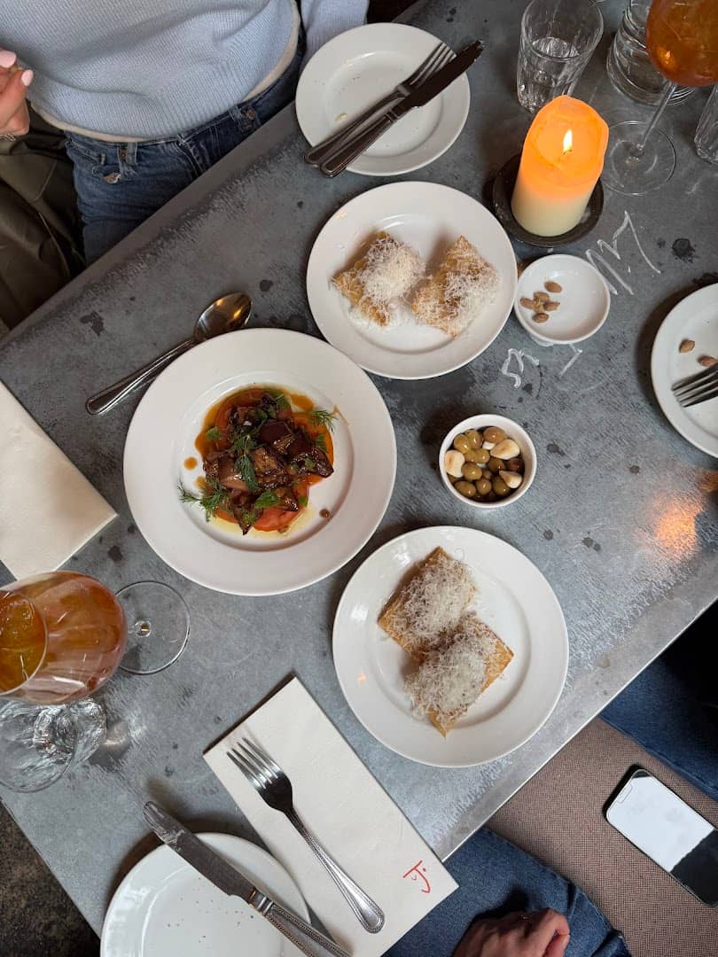 Table spread with pastries and mains at Jolene Bakery & Restaurant, London