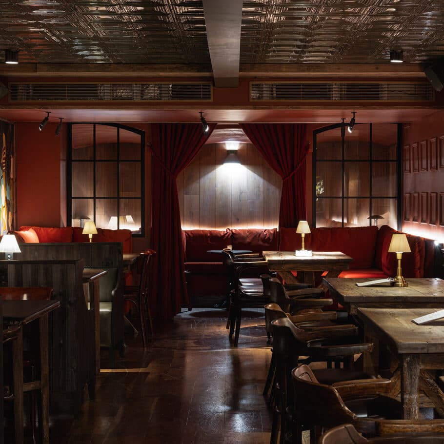 Elegant dining area with booth seating at The Orange Pub & Boutique Hotel Belgravia, London