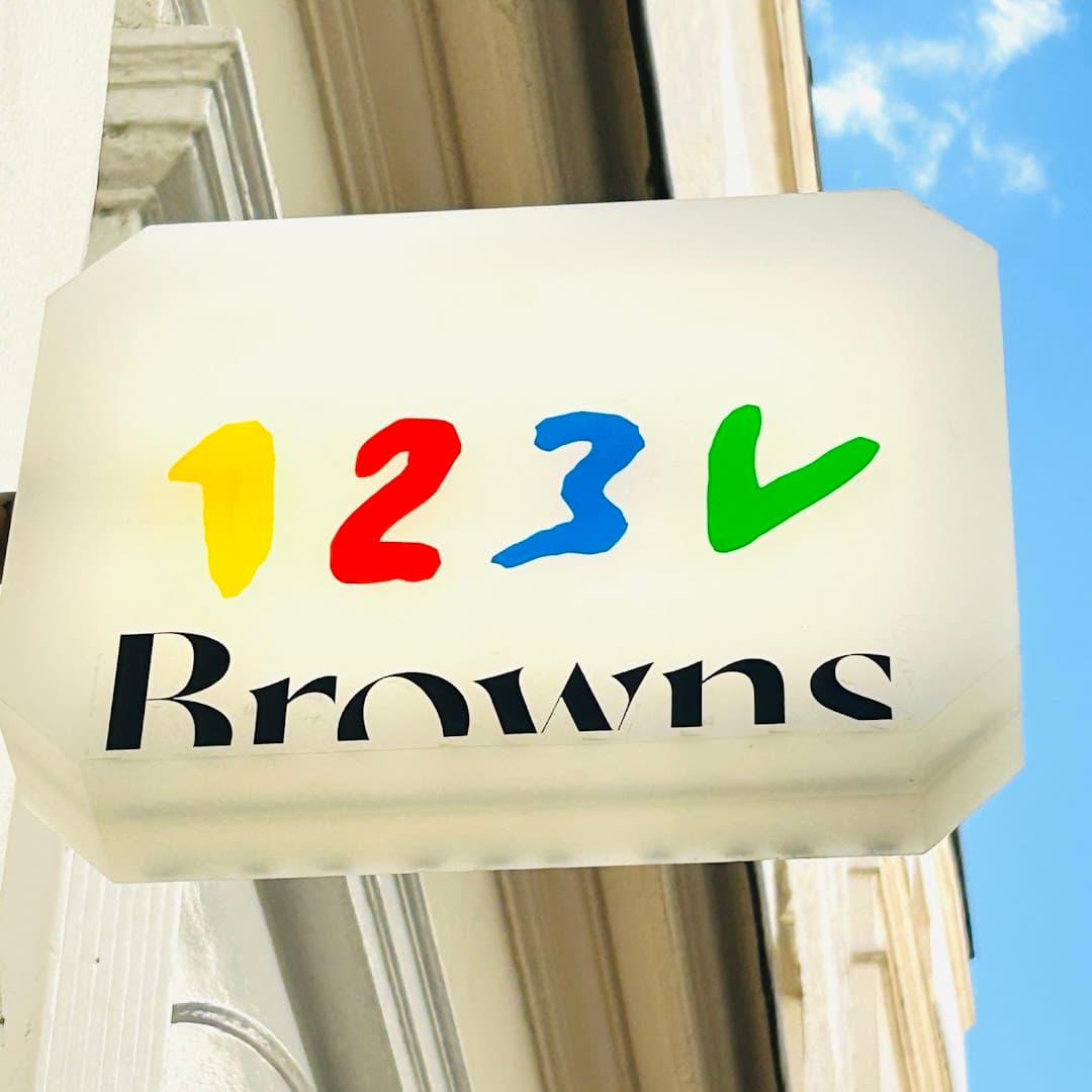 Front entrance signage at 123V Browns, London