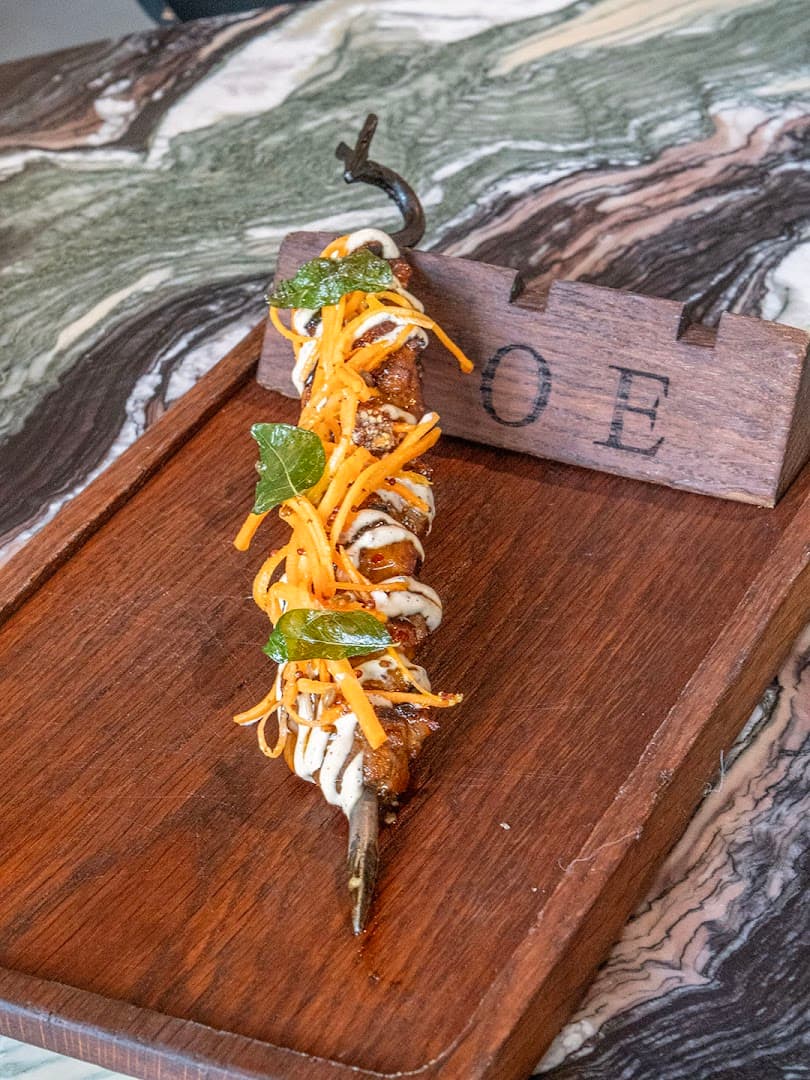 Grilled meat skewer at Roe, Canary Wharf, London