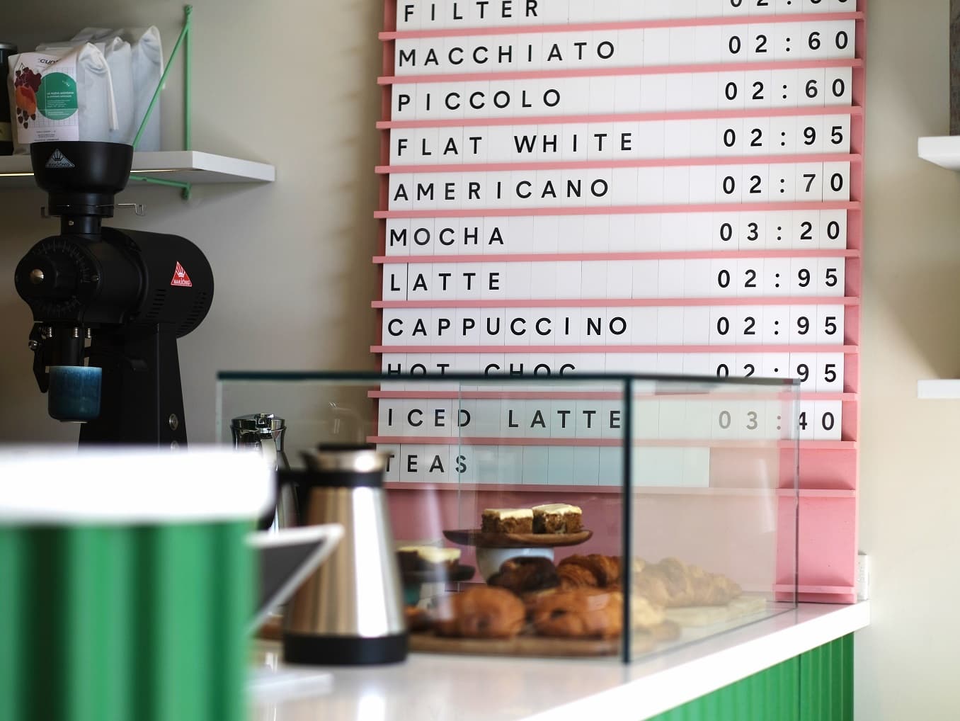 Coffee menu board and counter at Intermission Coffee, London