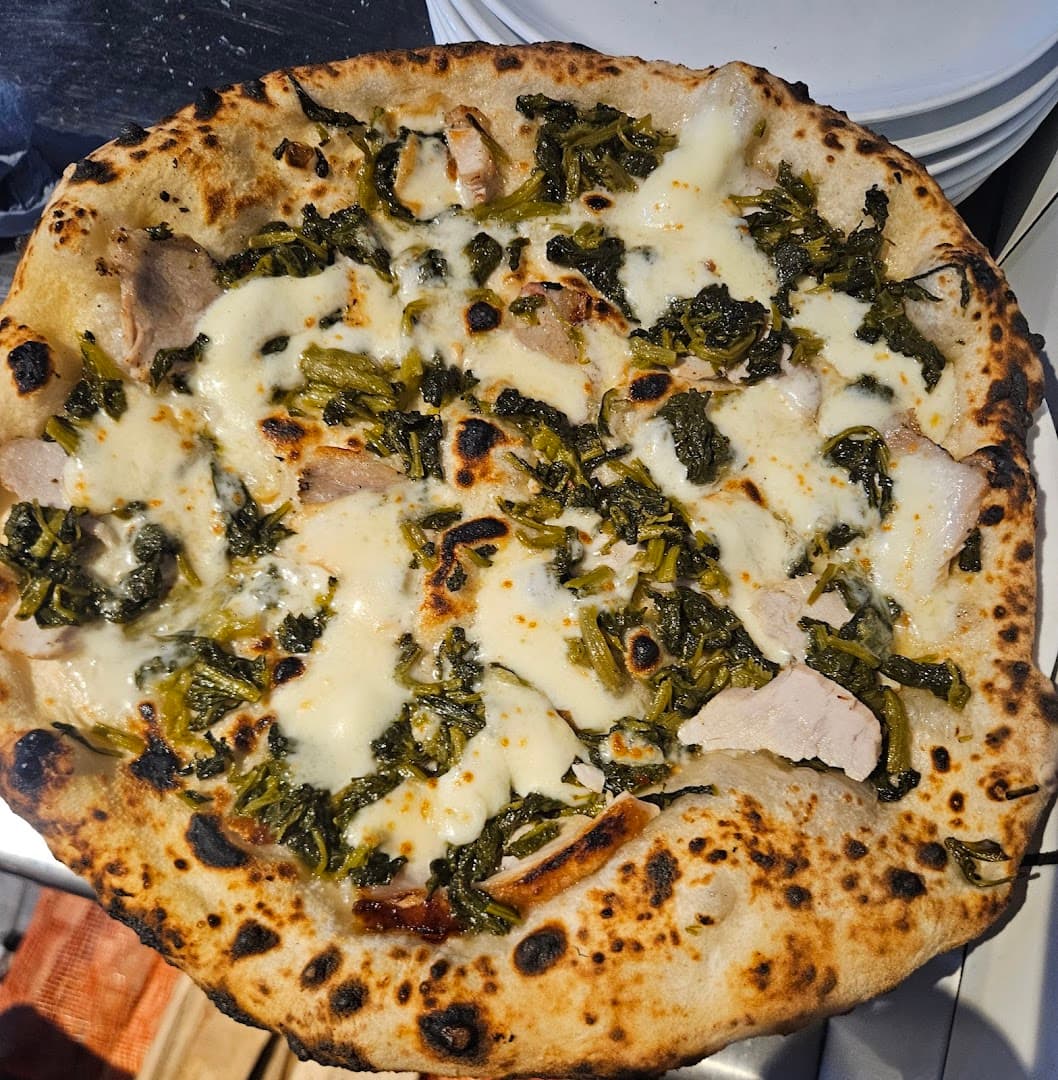 White pizza with chicken and greens at Bravi Ragazzi, London