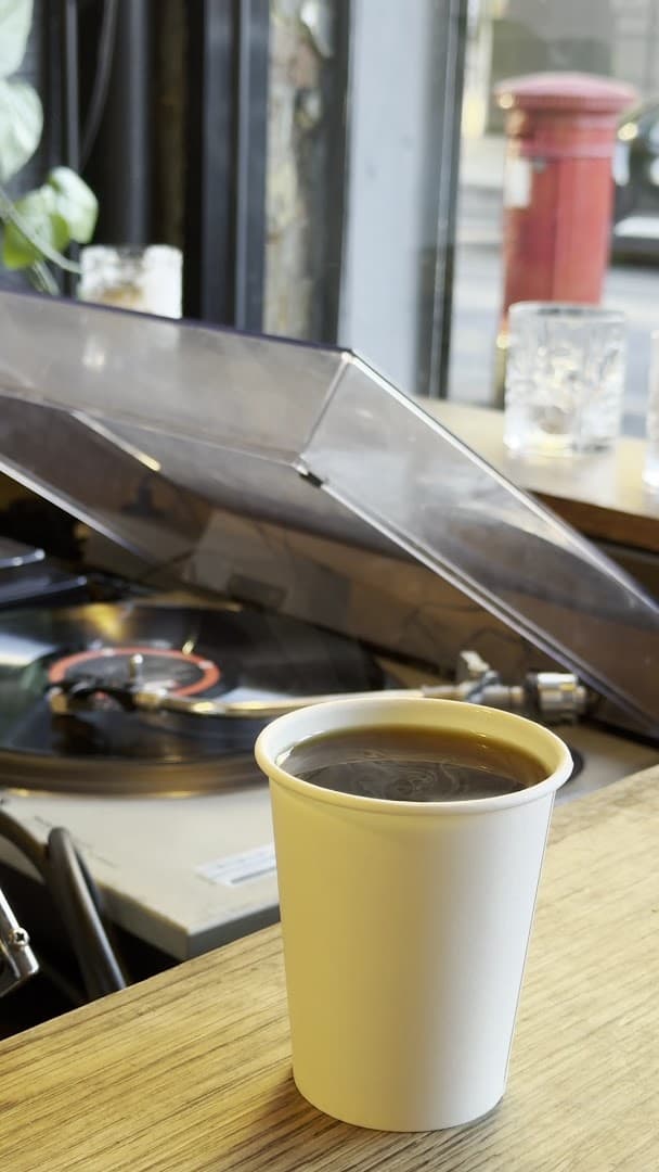 Coffee and turntable setting at Antipode, London
