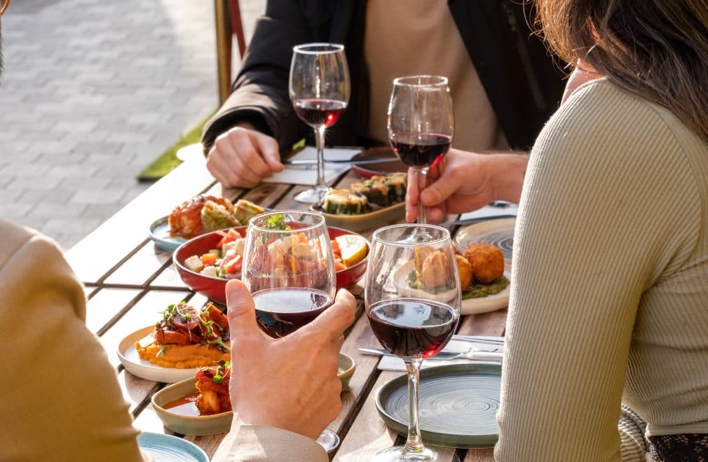 Outdoor dining with wine and tapas at Betto Tapas Restaurant & Cocktail Bar, London