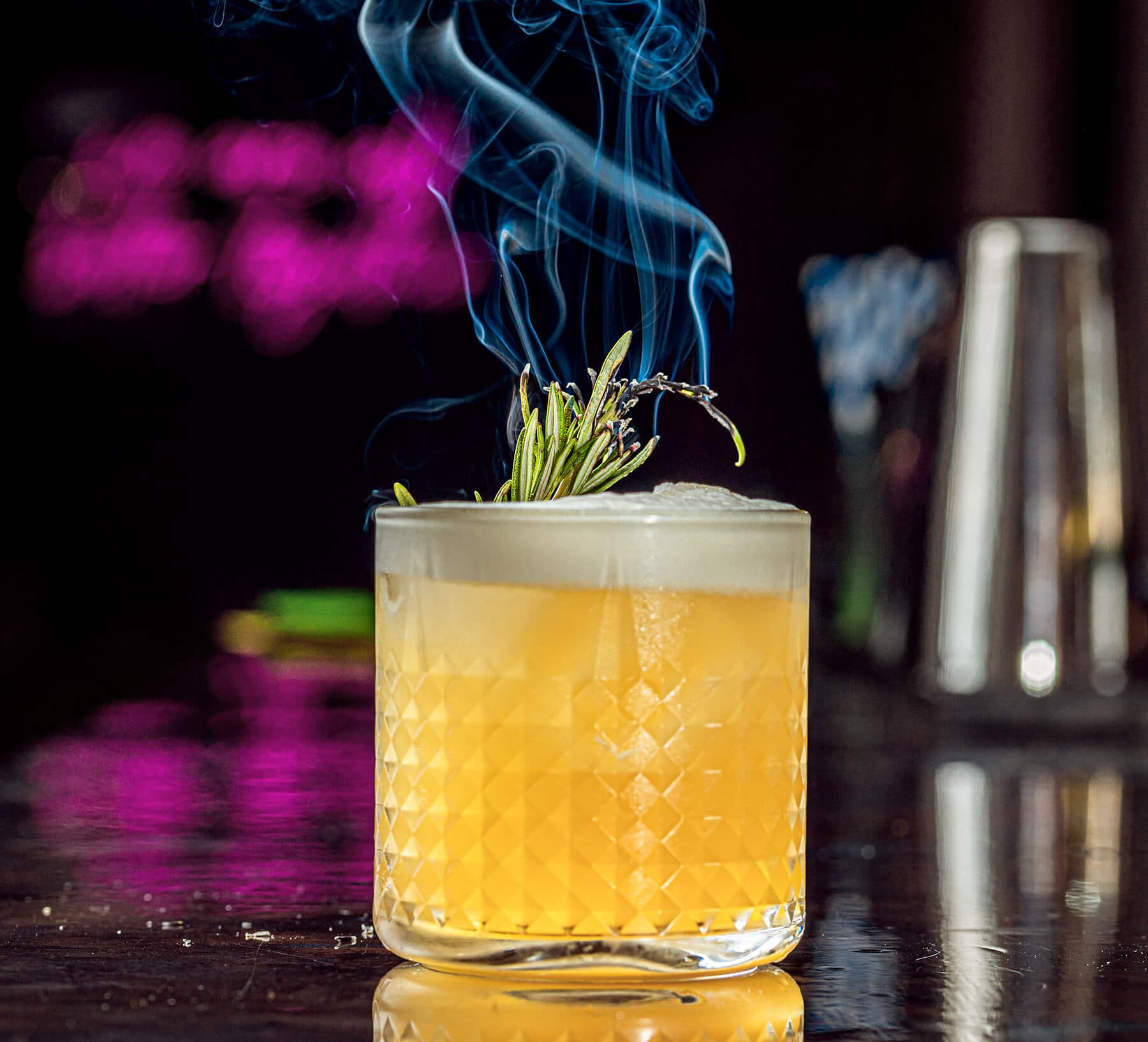 Smoked cocktail with rosemary garnish at Betto Tapas Restaurant & Cocktail Bar, London