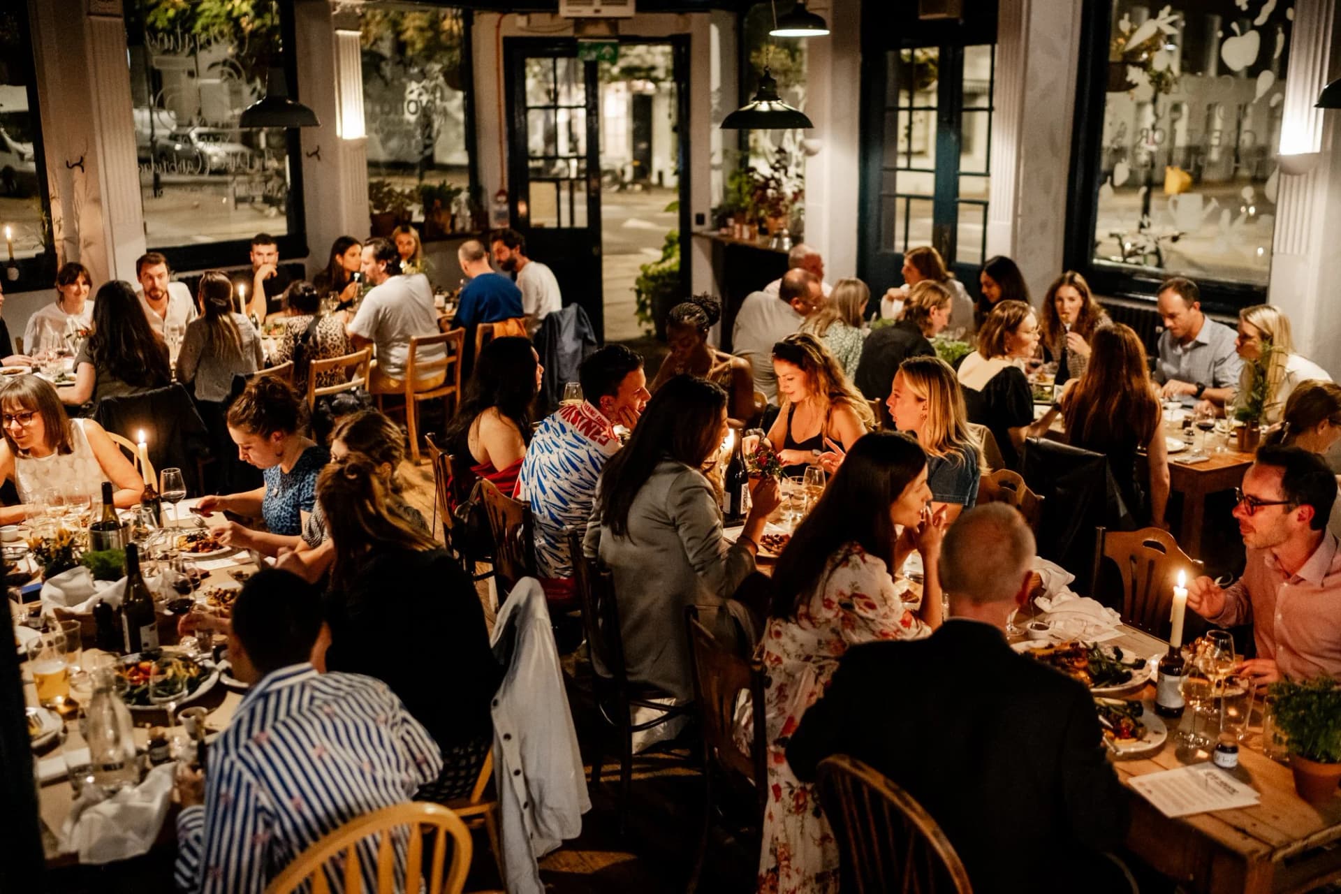Candlelit dinner gathering at The Duke Organic, London