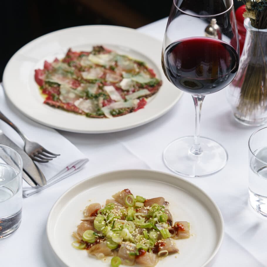Fine dining starters with wine at The Thomas Cubitt Pub Belgravia, London