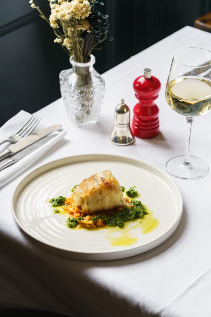 White fish with green sauce at The Thomas Cubitt Pub, Belgravia, London