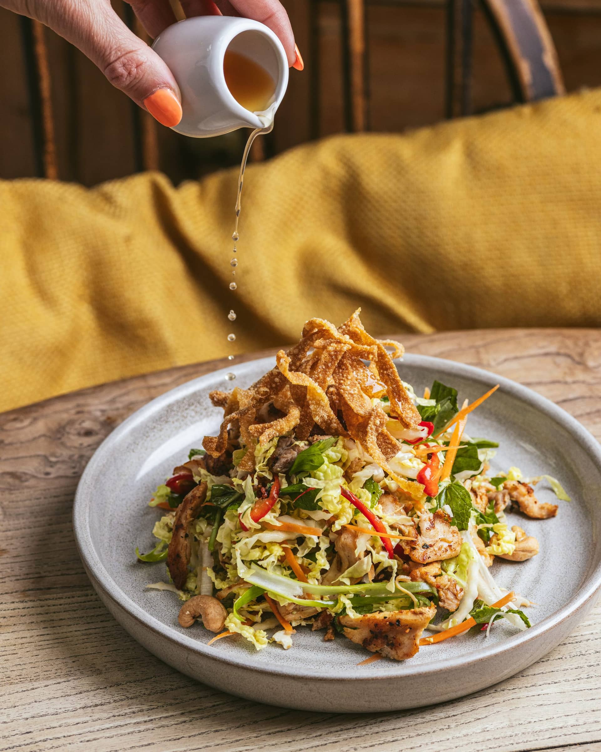 Asian fusion salad with dressing at Archie's, London