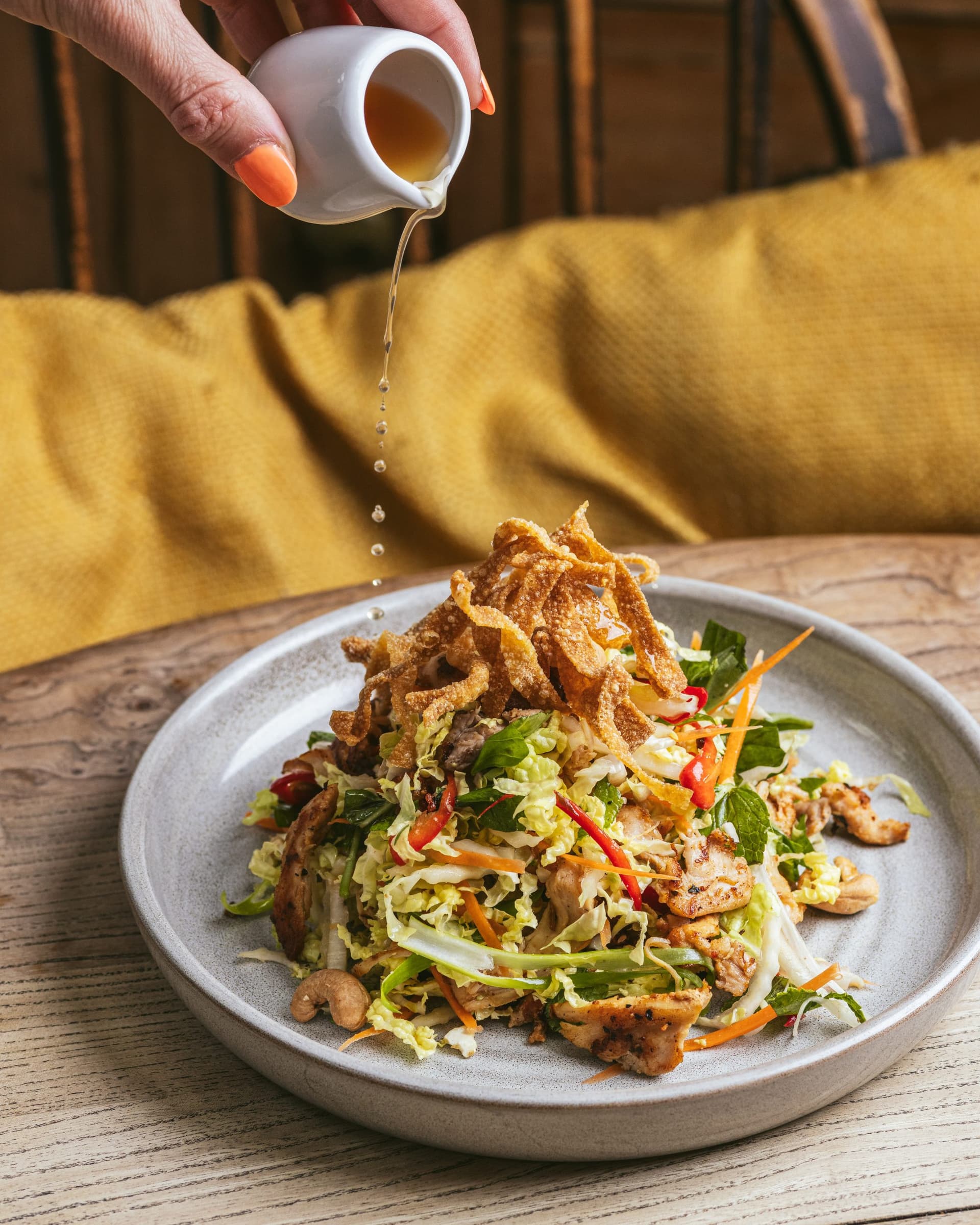 Asian fusion salad with dressing at Archie's, London