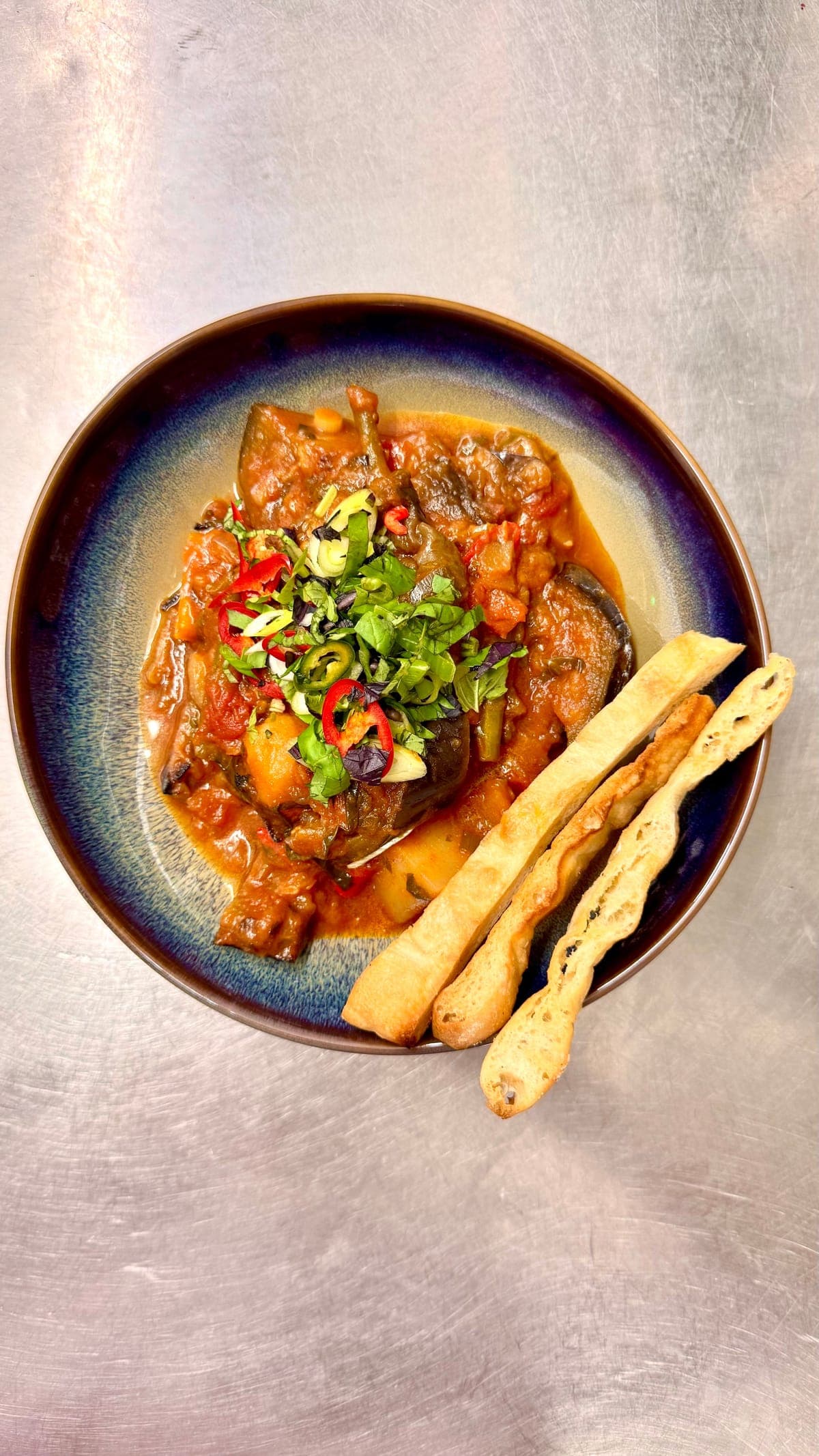 Georgian beef stew with herbs and breadsticks at Kartuli - Georgian Restaurant, East Dulwich, London