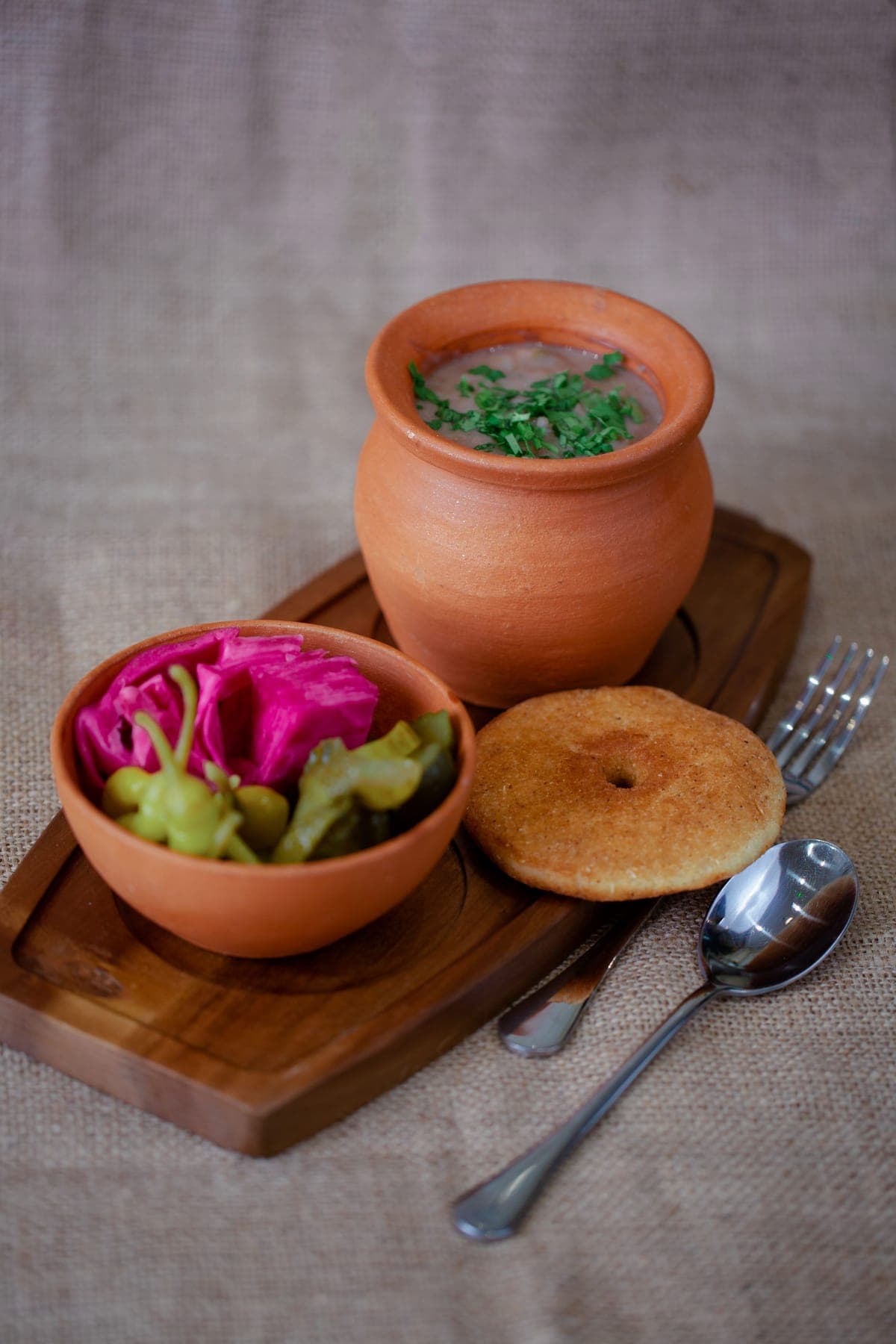 Traditional Georgian soup with pickles at Kartuli - Georgian Restaurant in East Dulwich, London