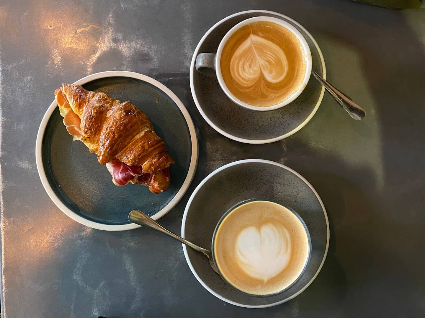 Croissant and coffee at Tamp Coffee, London