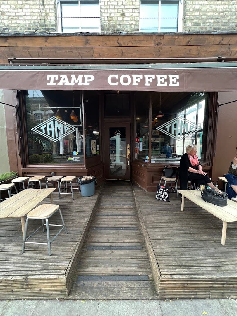 Outdoor seating area at Tamp Coffee, London
