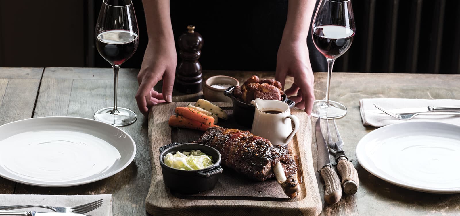 Roasted meat platter with wine at The Harwood Arms, London