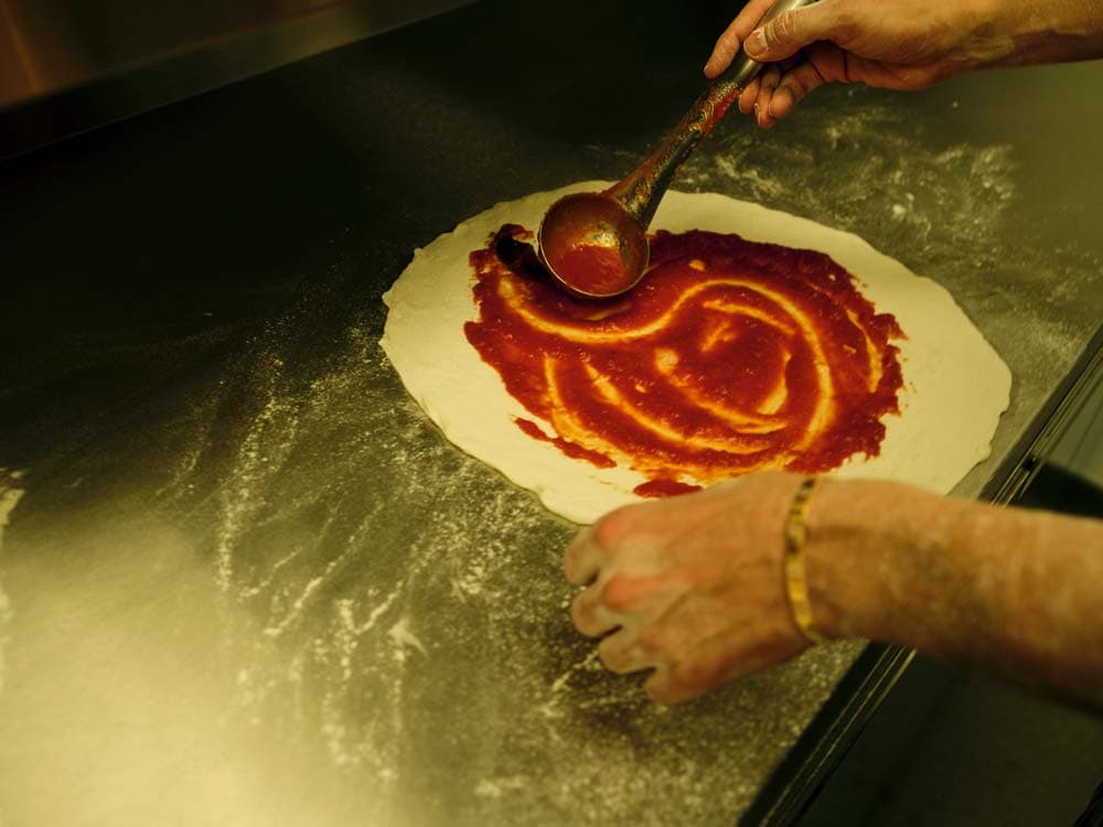 Pizza preparation at Crisp W1, London