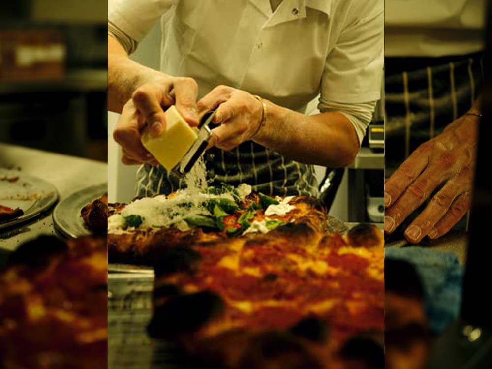 Pizza preparation at Crisp W1, London