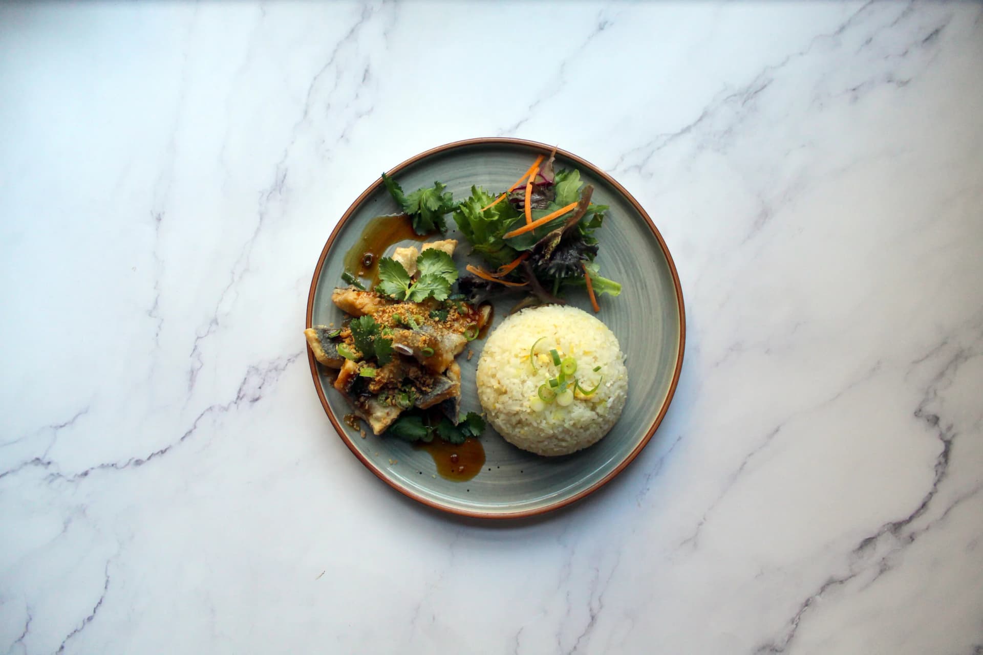 Asian fusion rice dish at Kin + Deum, London