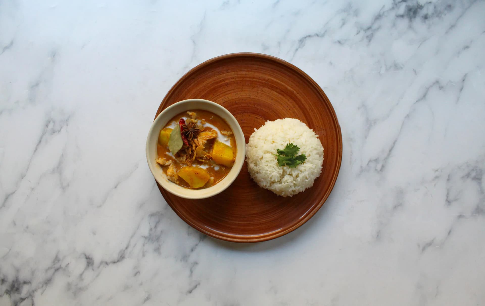 Curry and rice dish at Kin + Deum, London