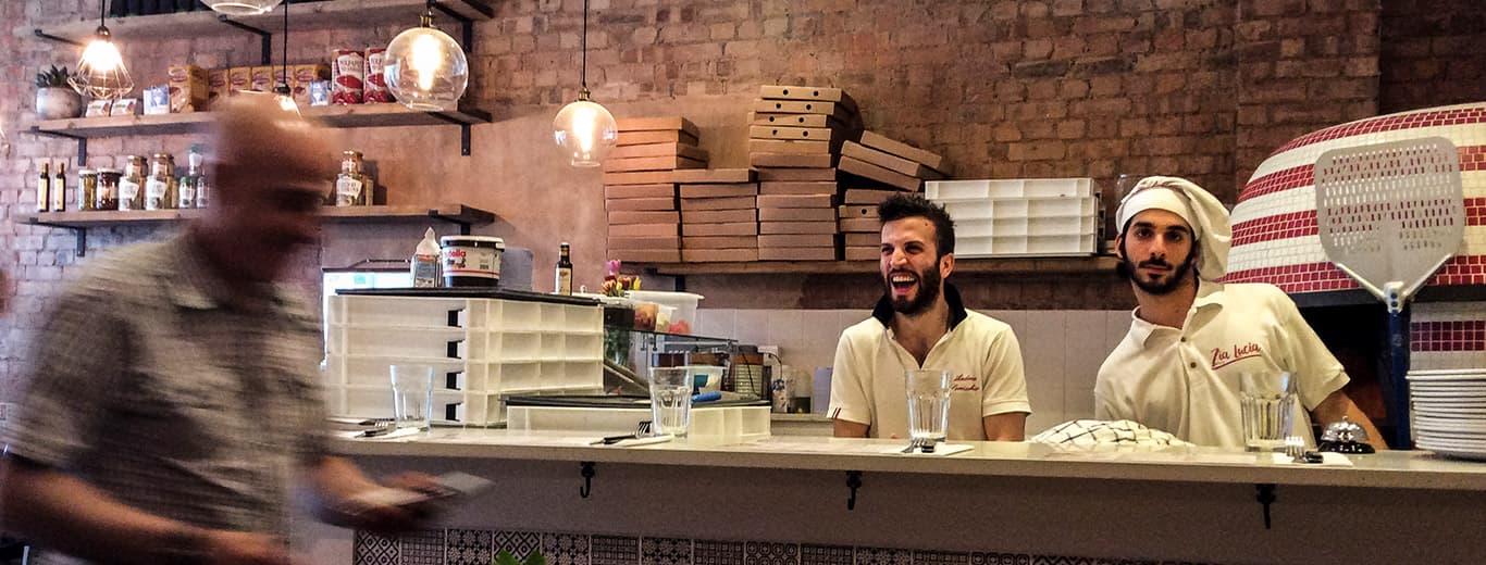 Pizza counter staff at Zia Lucia, West Hampstead, London