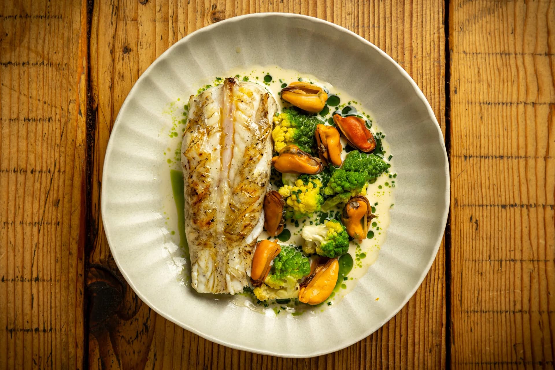 Grilled fish with mussels and romanesco at Barge East, London