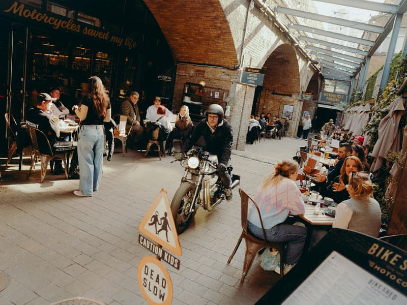 Outdoor terrace with motorcycle at Bike Shed Moto Co., London