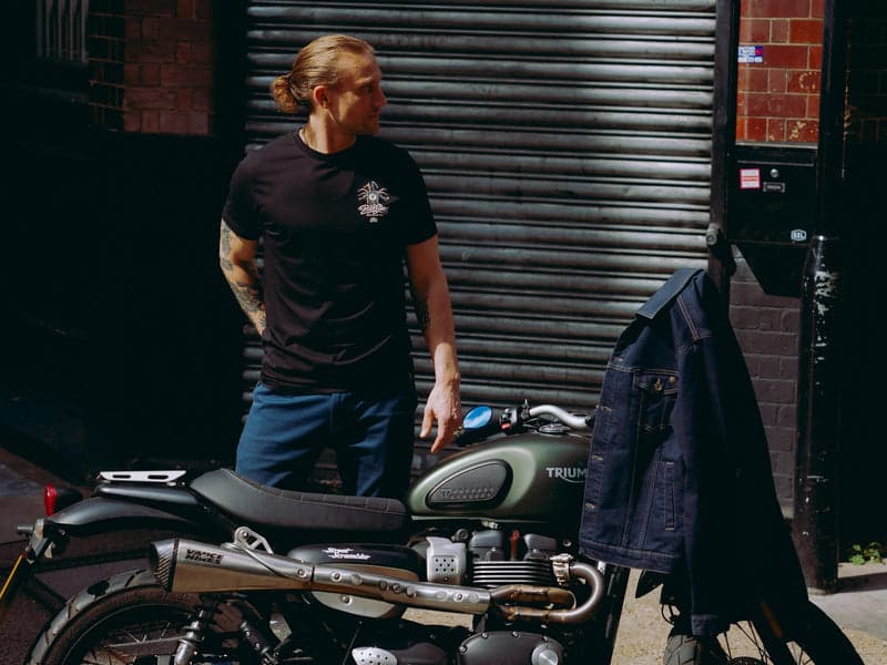 Storefront with Triumph motorcycle at Bike Shed Moto Co., London