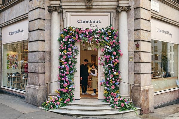 Floral entrance arch at Chestnut Bakery, Covent Garden, London