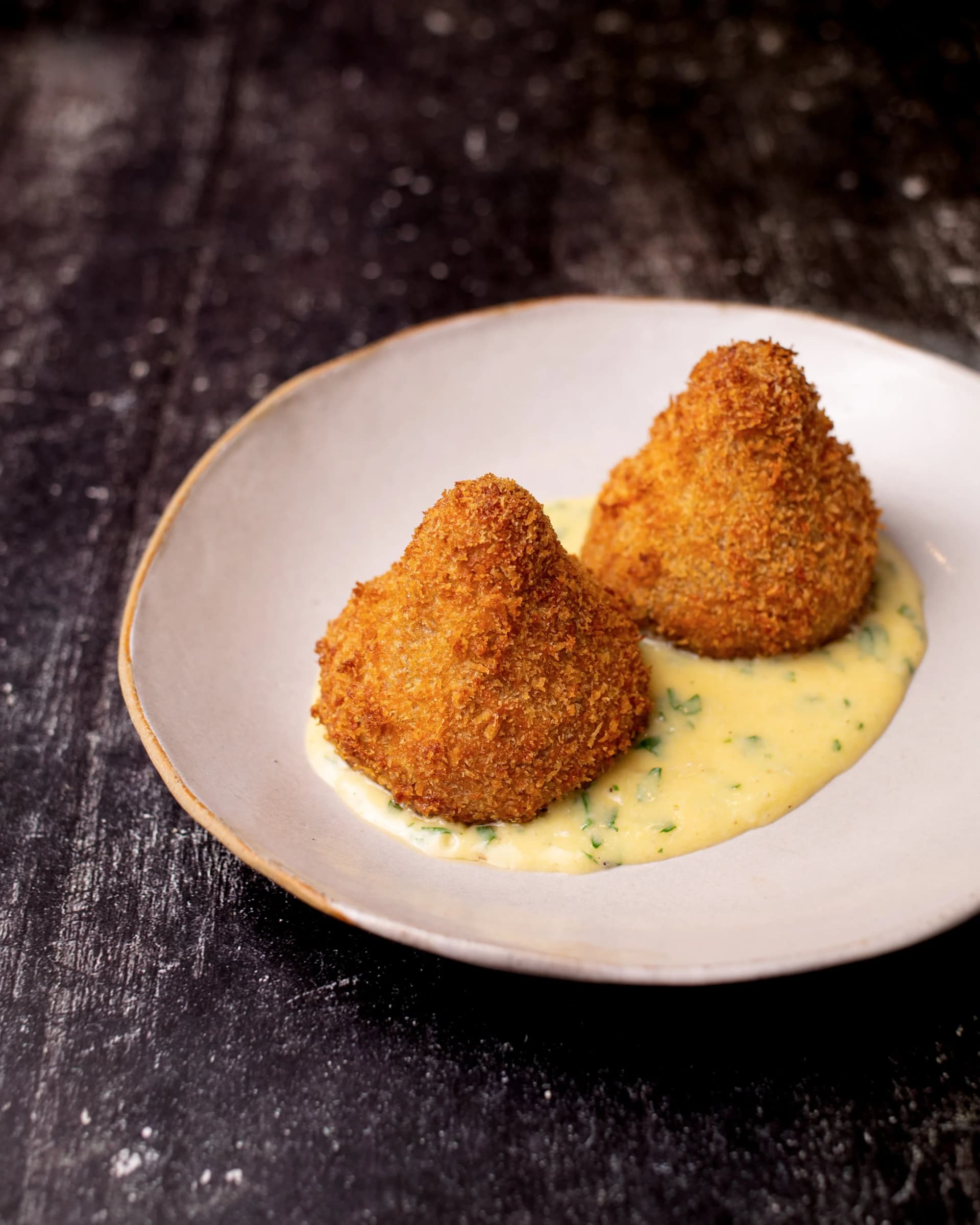 Breaded croquettes with cream sauce at Greenberry Café, London