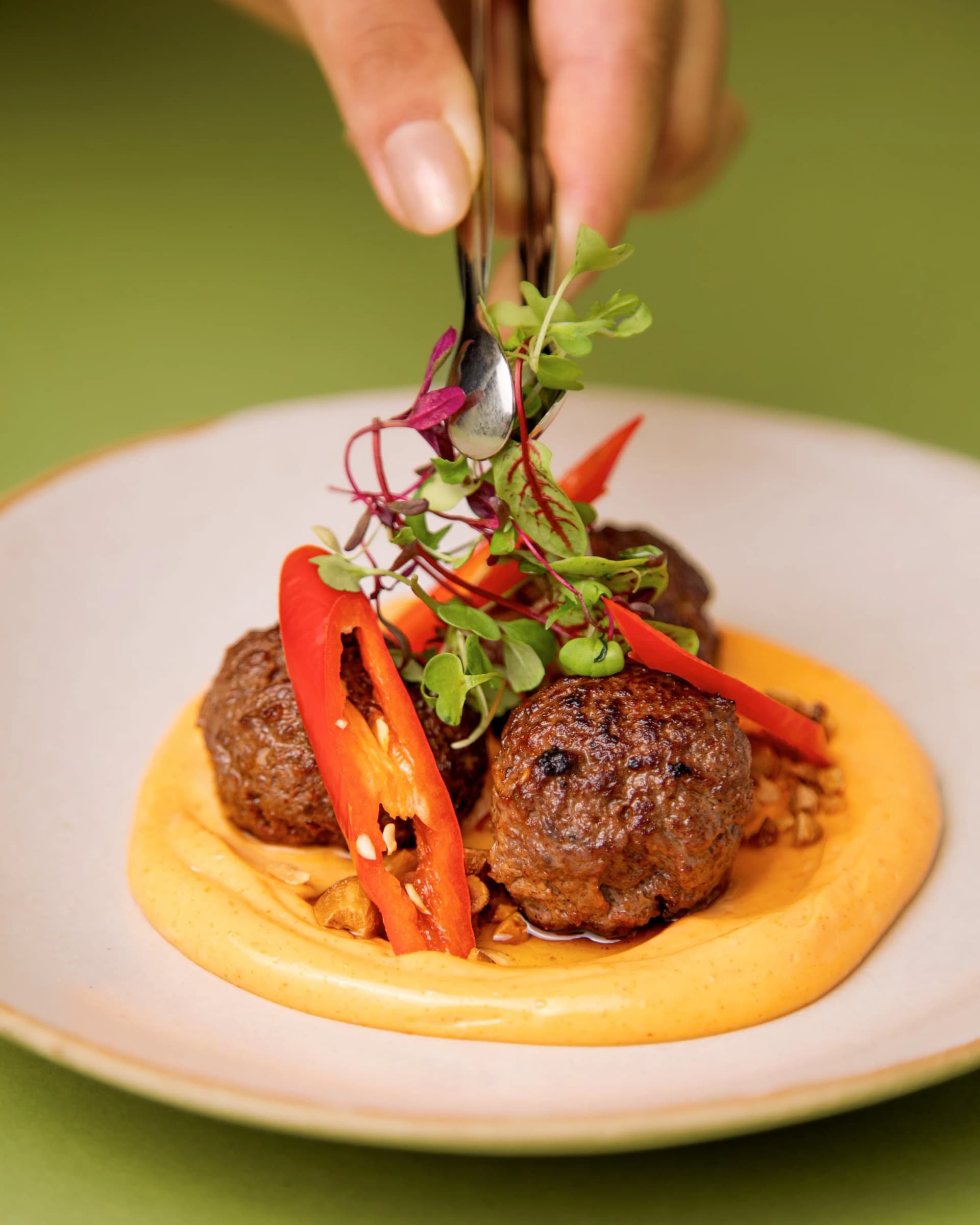 Meatballs with pepper garnish at Greenberry Café, London