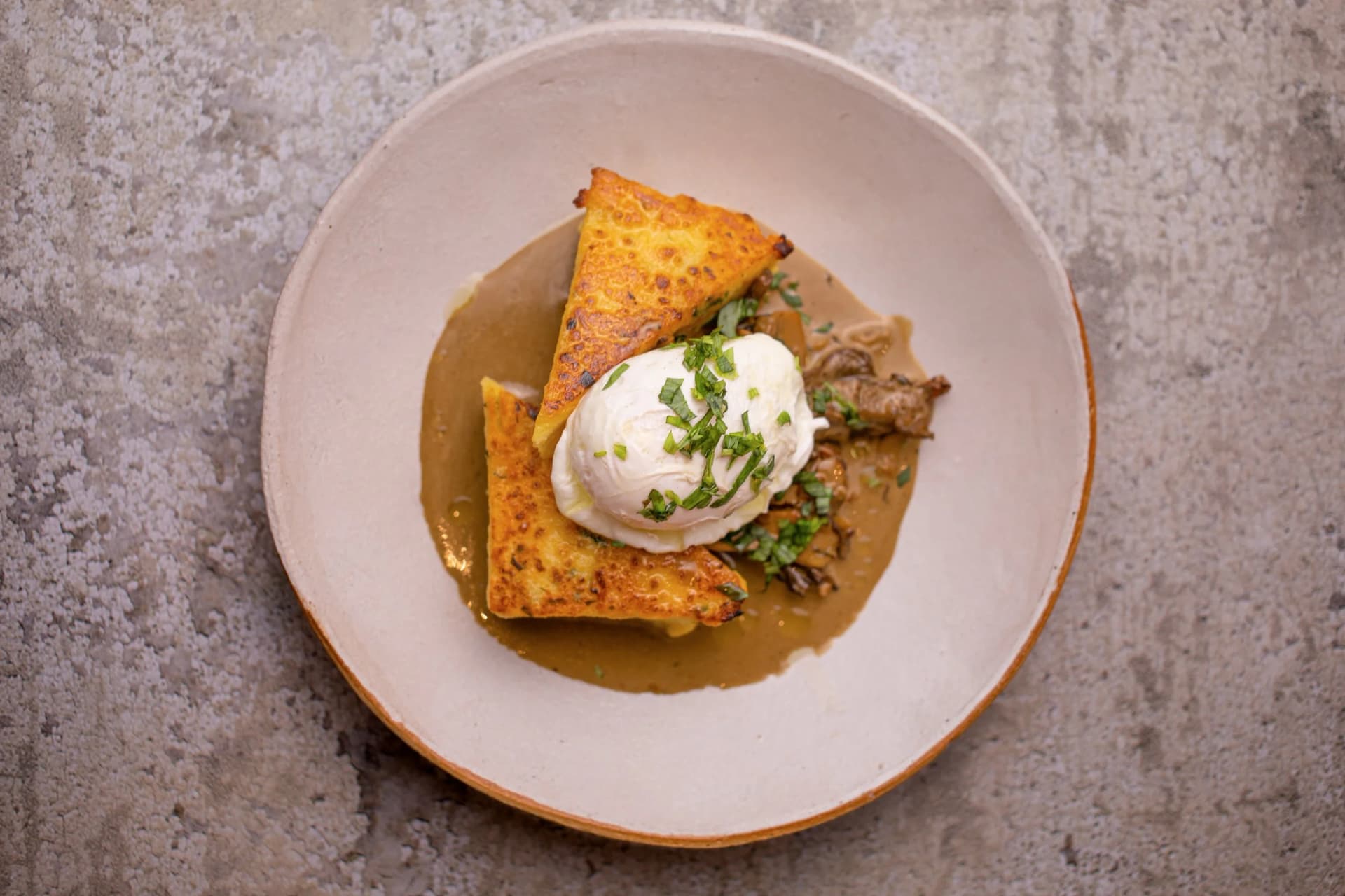 Poached egg mushroom toast dish at Greenberry Café, London