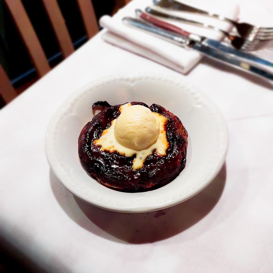 Chocolate fondant dessert with vanilla ice cream at La Bouffe, London