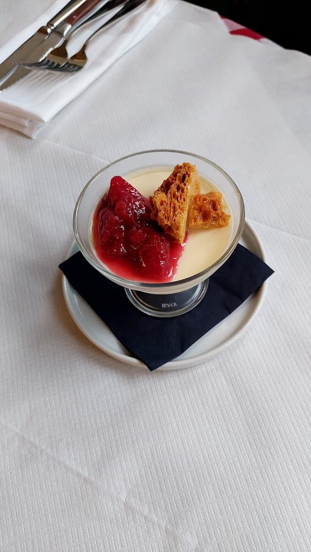 Dessert panna cotta with strawberry compote at La Bouffe, London