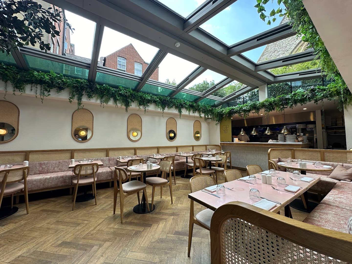 Glass roof dining room at Oak&Poppy, London