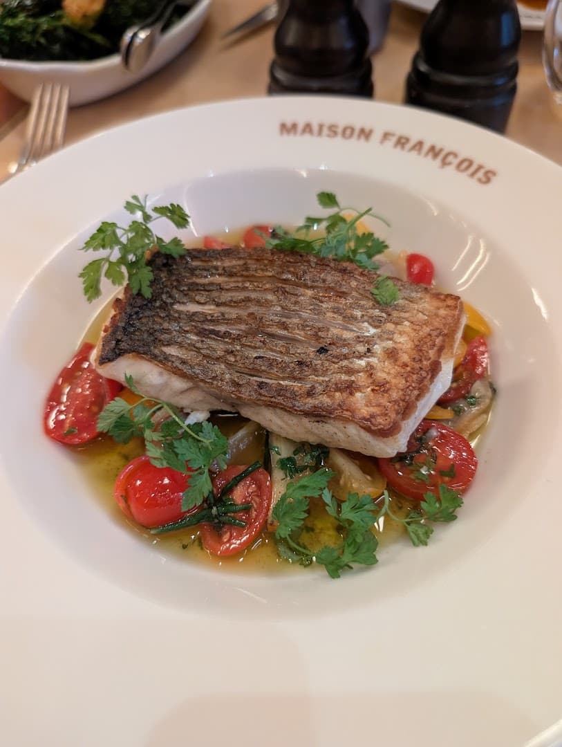 Grilled fish fillet with cherry tomatoes at Maison François, London