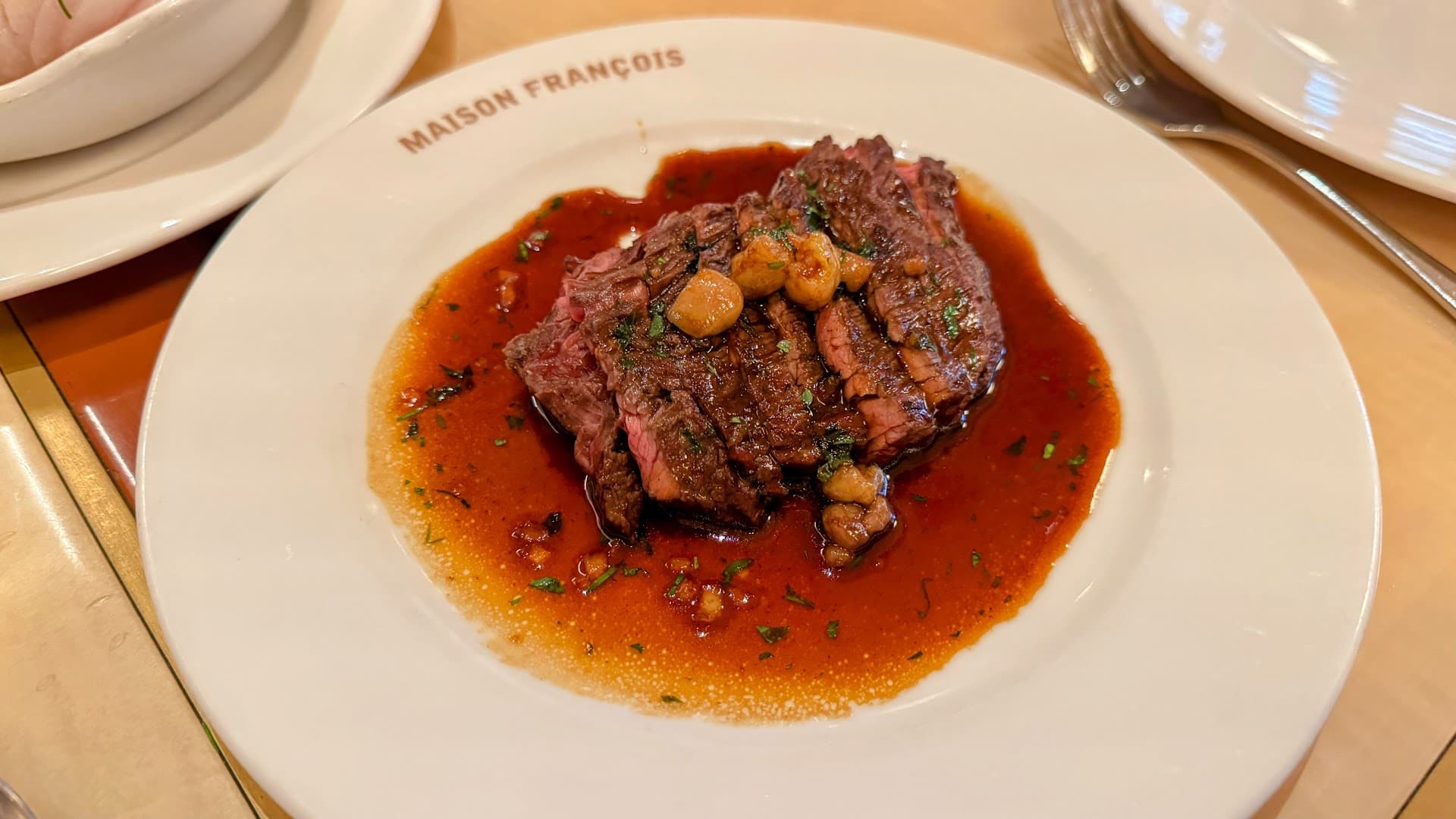 Sliced steak with garlic butter at Maison François, London