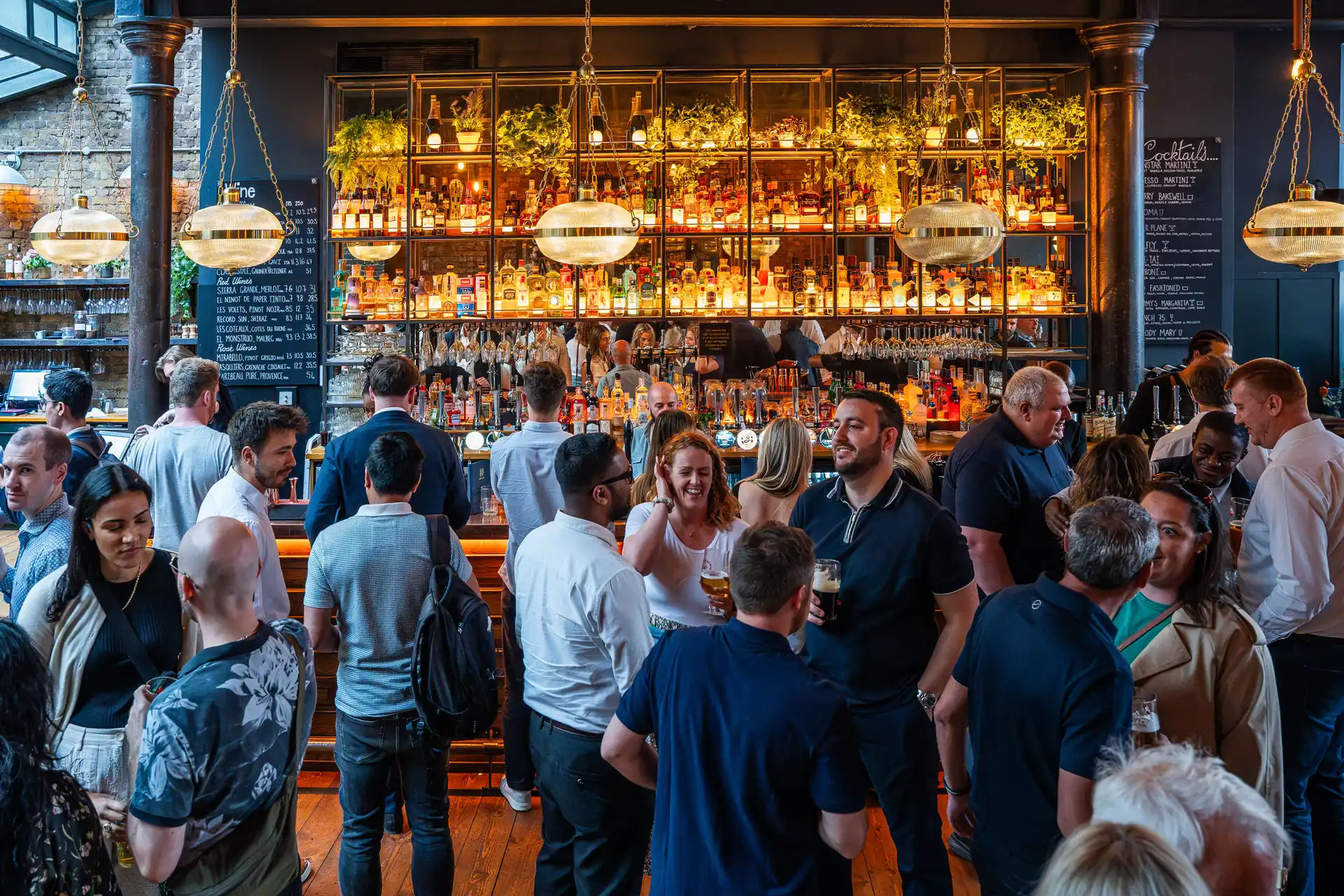 Busy bar area at The Wren Tavern, London