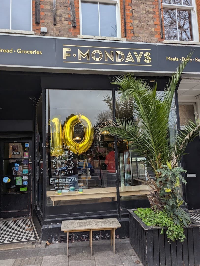 Front entrance with anniversary celebration at F. Mondays, London