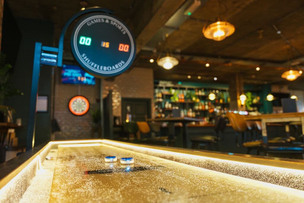 Shuffleboard table game area at King Of Prussia, London