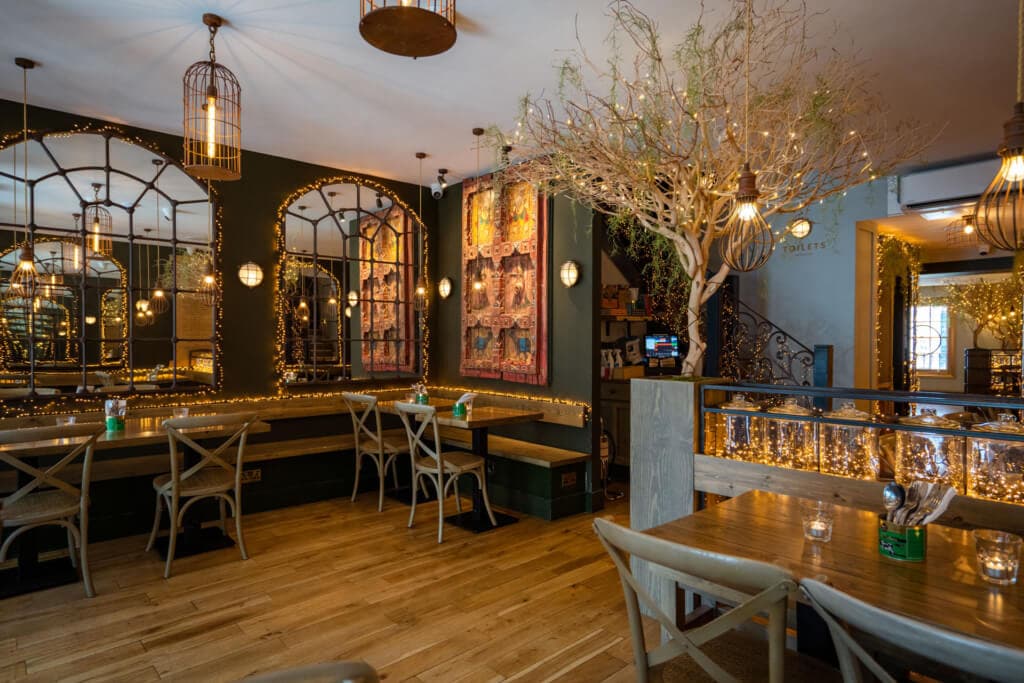 Festive dining room at Mowgli Street Food Charlotte Street, London