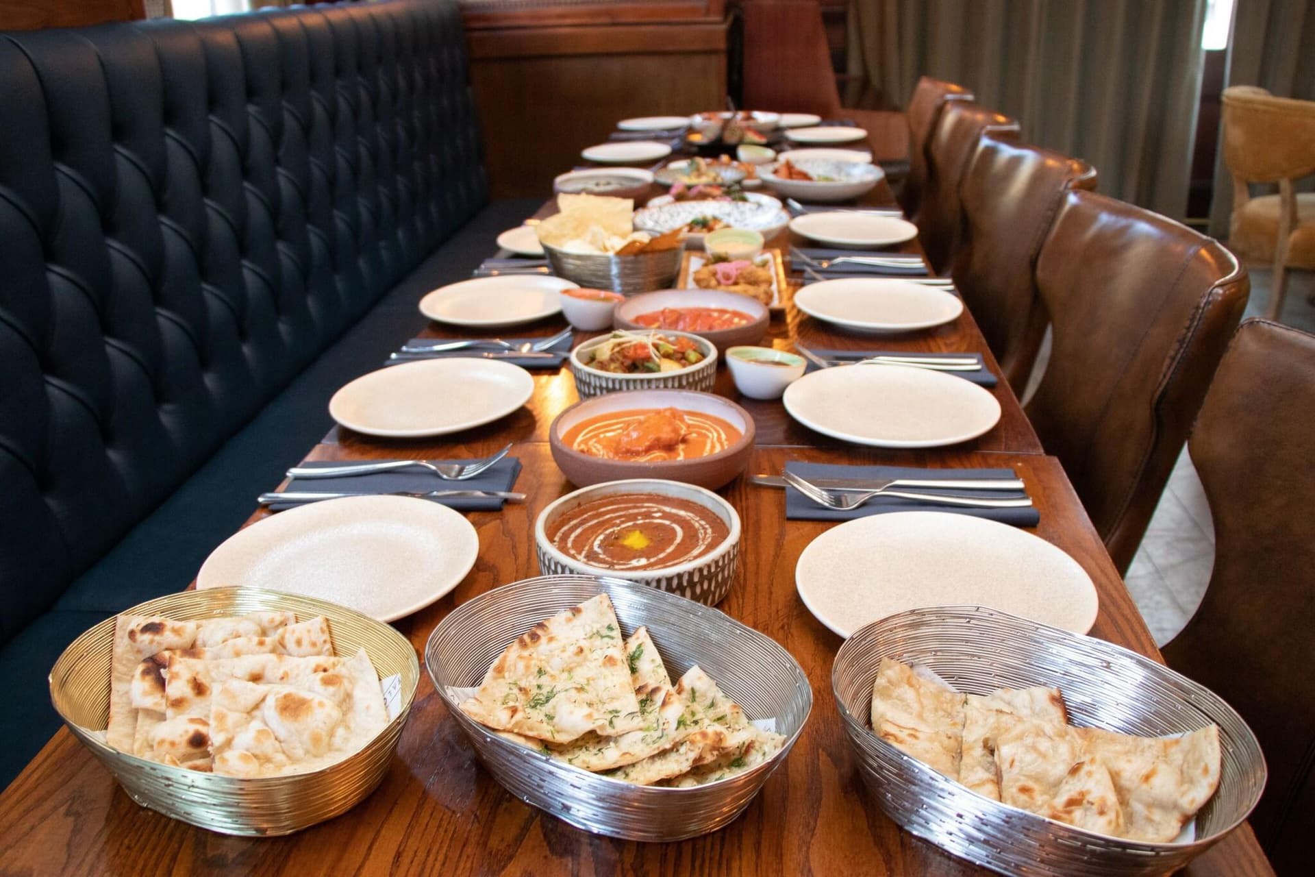 Indian curry feast spread at Three Falcons Hotel & Pub, London