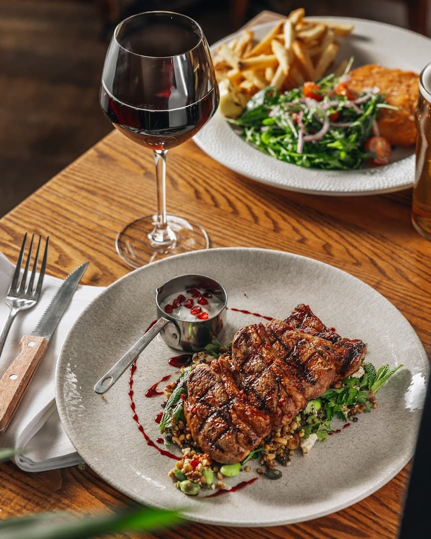 Grilled meat dish with red wine at The Windsor Castle, London
