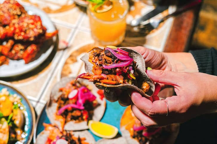 Taco platter with pickled onions at Love Shack, London
