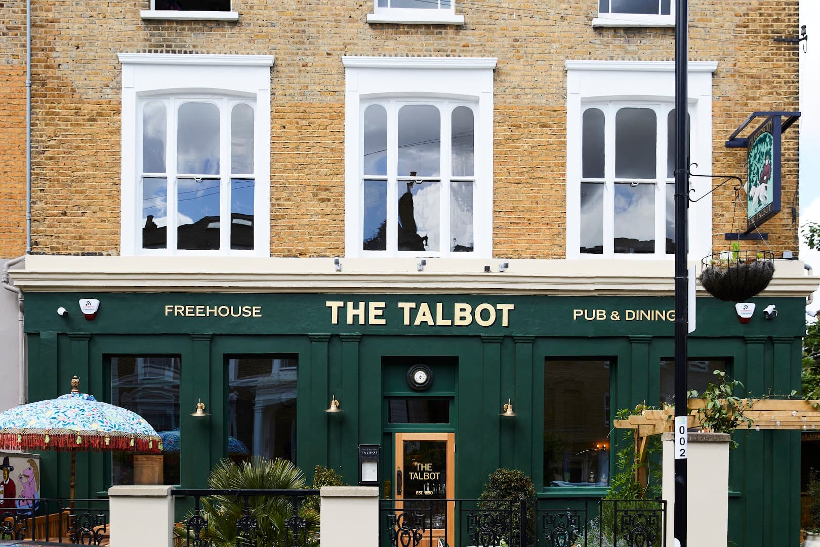 Front facade with outdoor seating at The Talbot, London